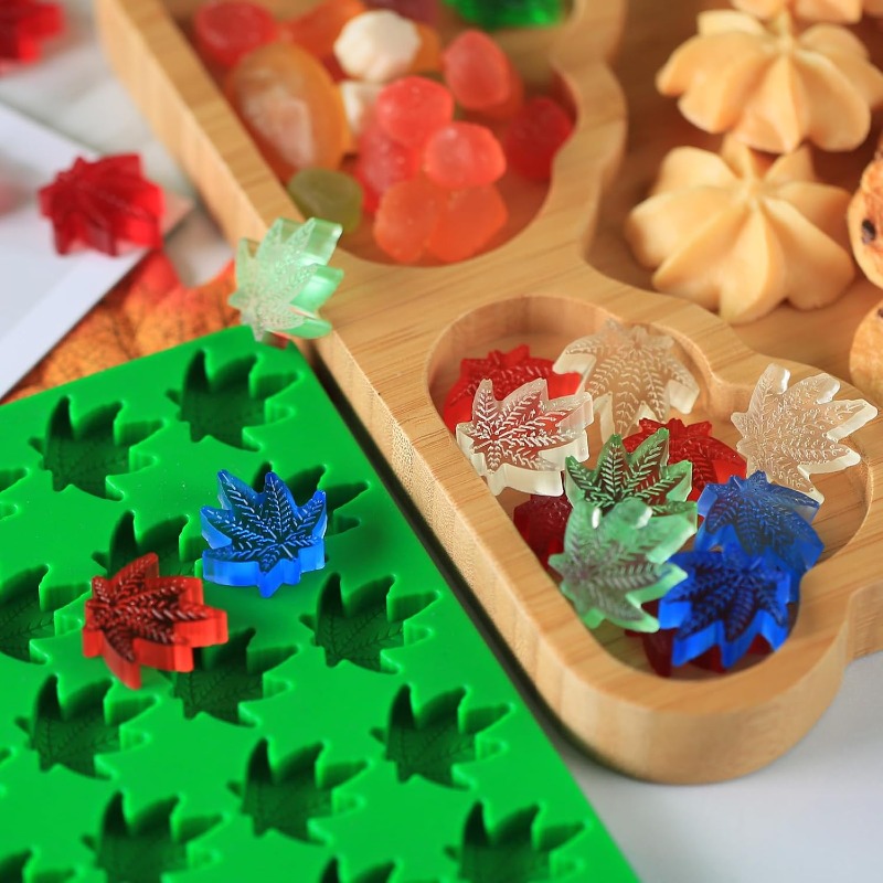 マリファナ、大麻、麻の葉の形をした70個の空洞を持つシリコン - Gummy Candy のレビューと価格